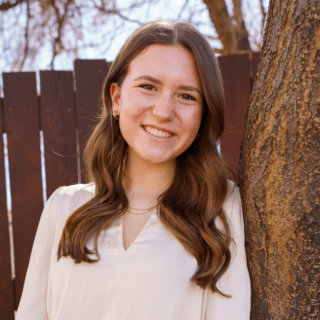 Portrait of a smiling young woman.