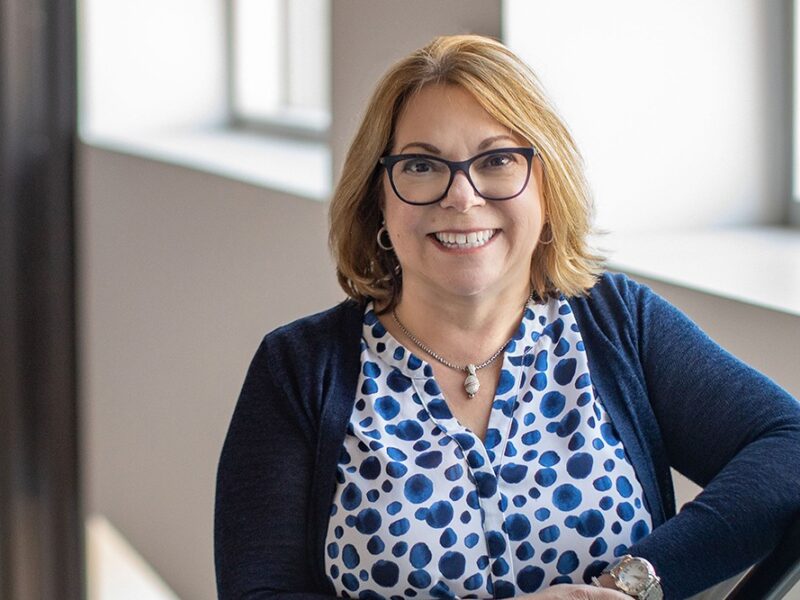 Balancing the Books and Breaking Barriers: Lori Palazzolo’s Legacy